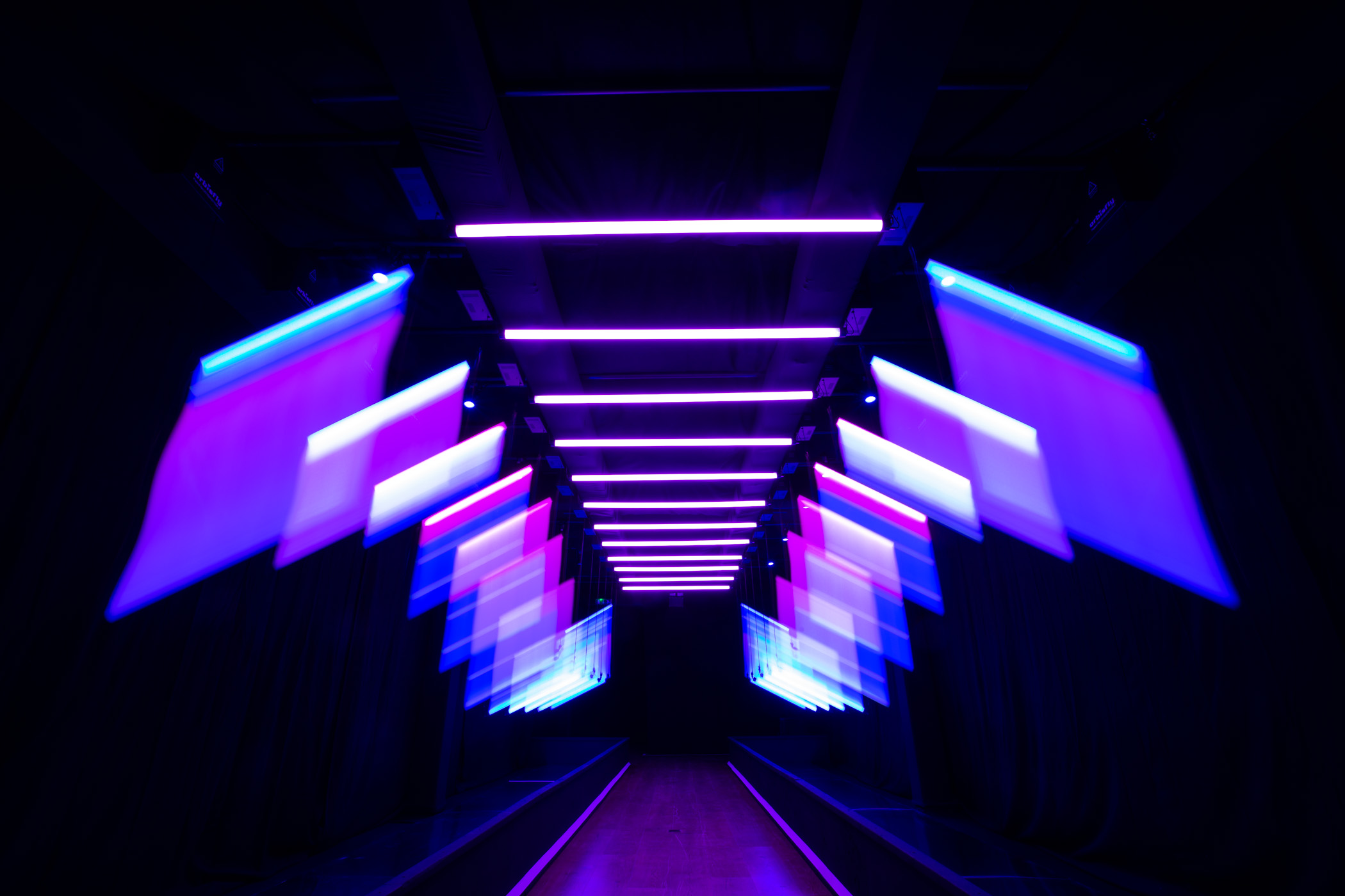 Installation view of Parallels immersive mirrored light environment.